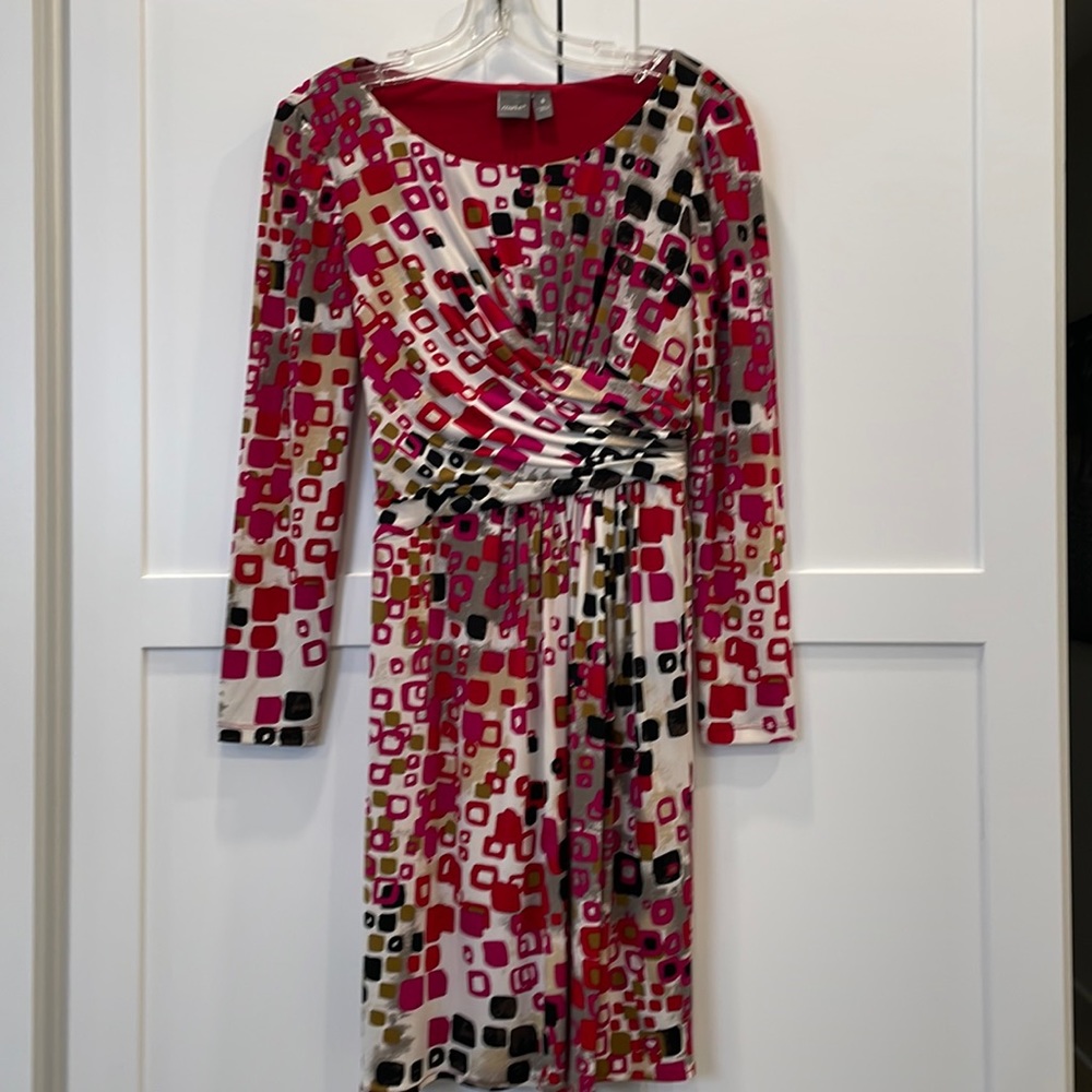 Size 6 with slimming side ruching. silky print with red, gold, fuchsia